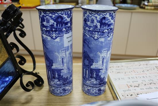 A modern Persian style two handled vase and a pair of blue and white sleeve vases
